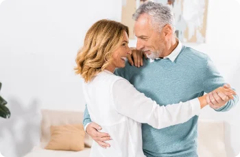 A couple dancing with each other.